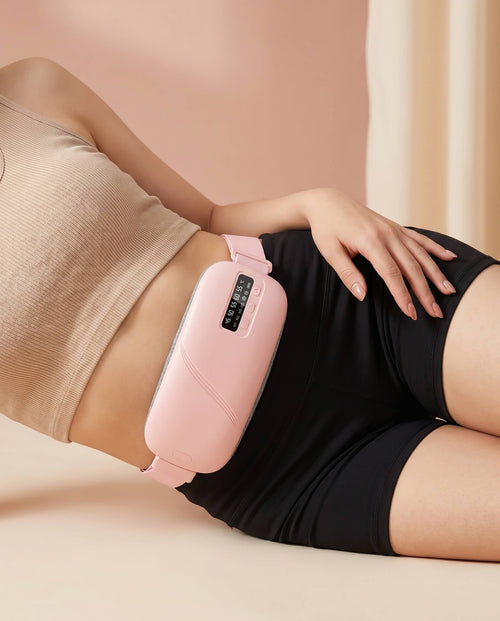 Person using Avaleira massage heating belt on a beige background